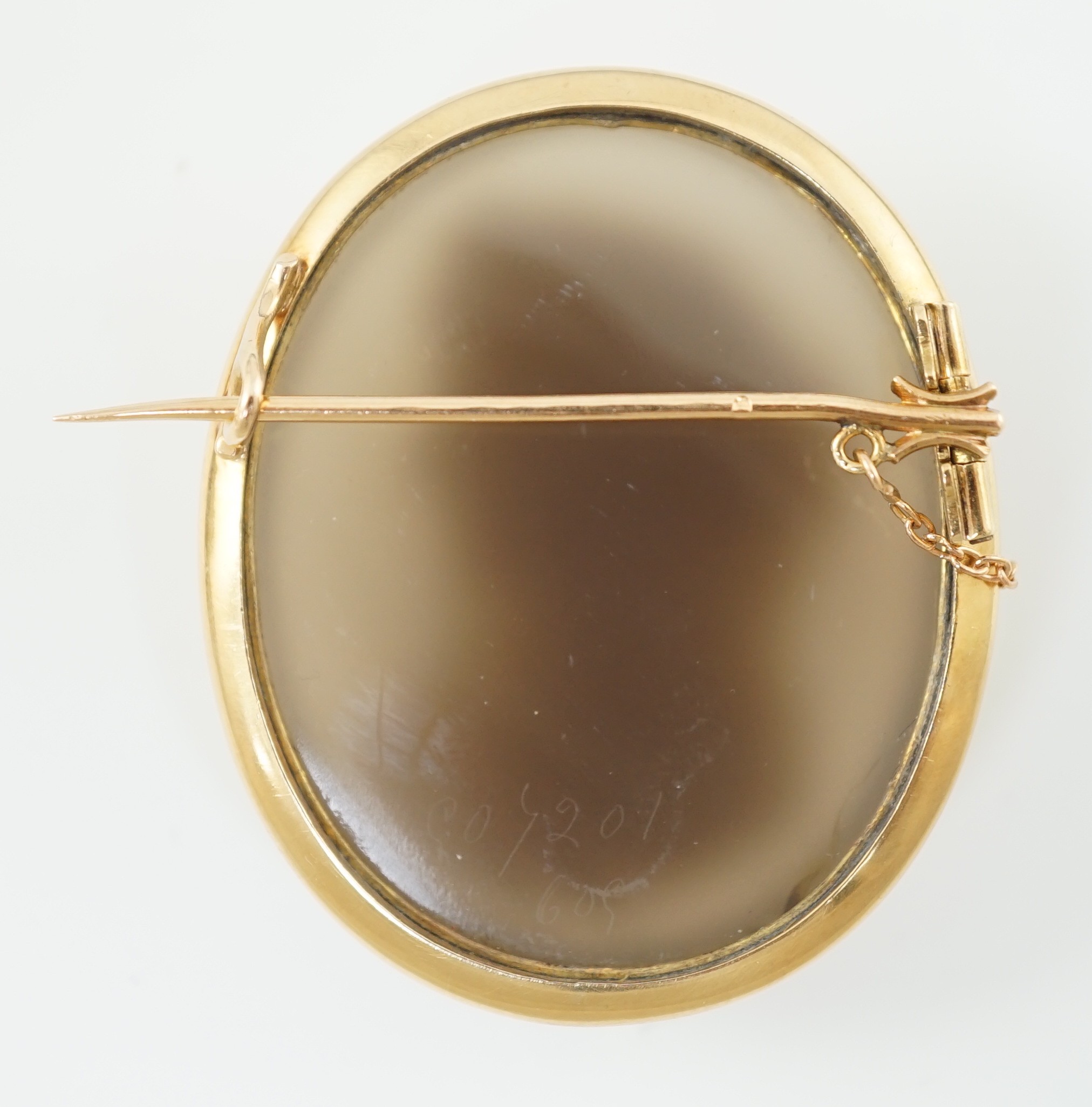 A late 19th/early 20th century gold mounted chalcedony cameo set oval brooch